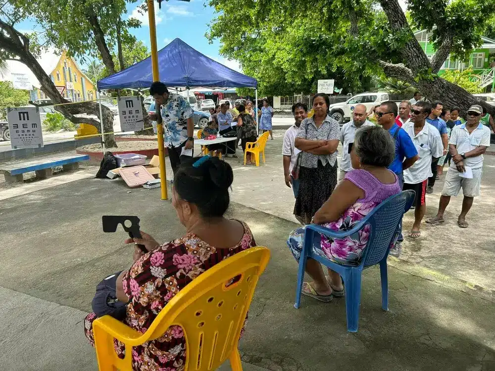 People lining up to have their eyes tested at the free community eye screening in Kiribati.