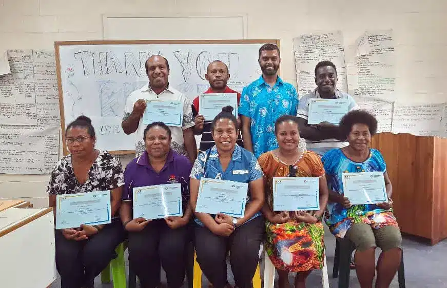 The eight participants with their course certificates