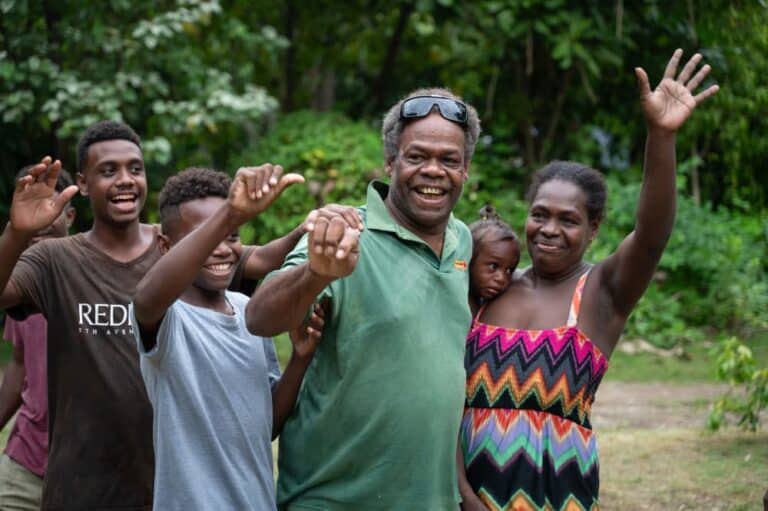 Rostiko is greeted by his family on his return home after having his sight restored