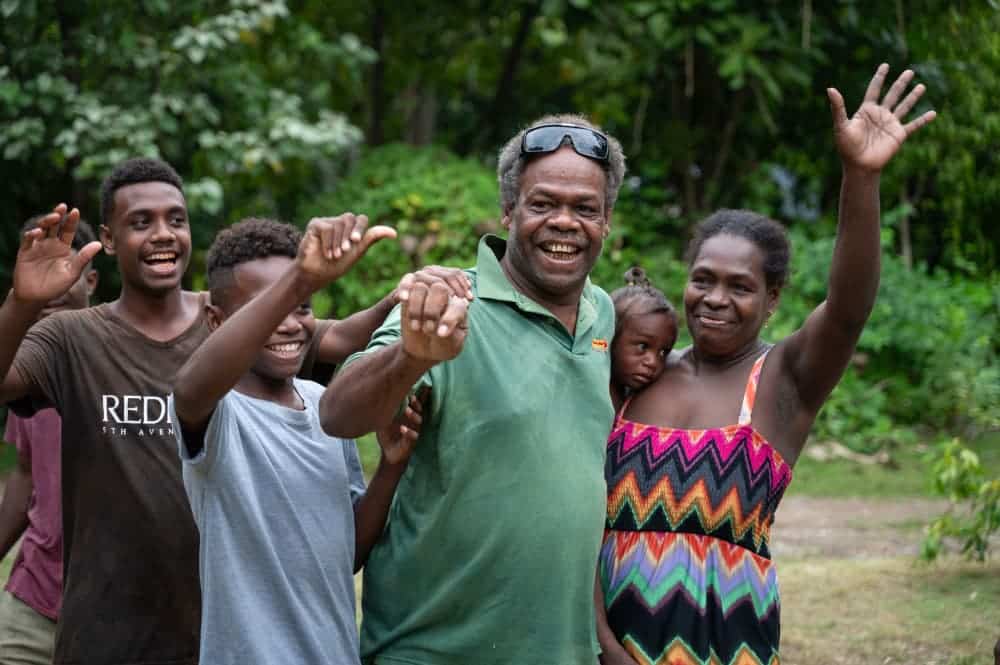 Rostiko is greeted by his family on his return home after having his sight restored