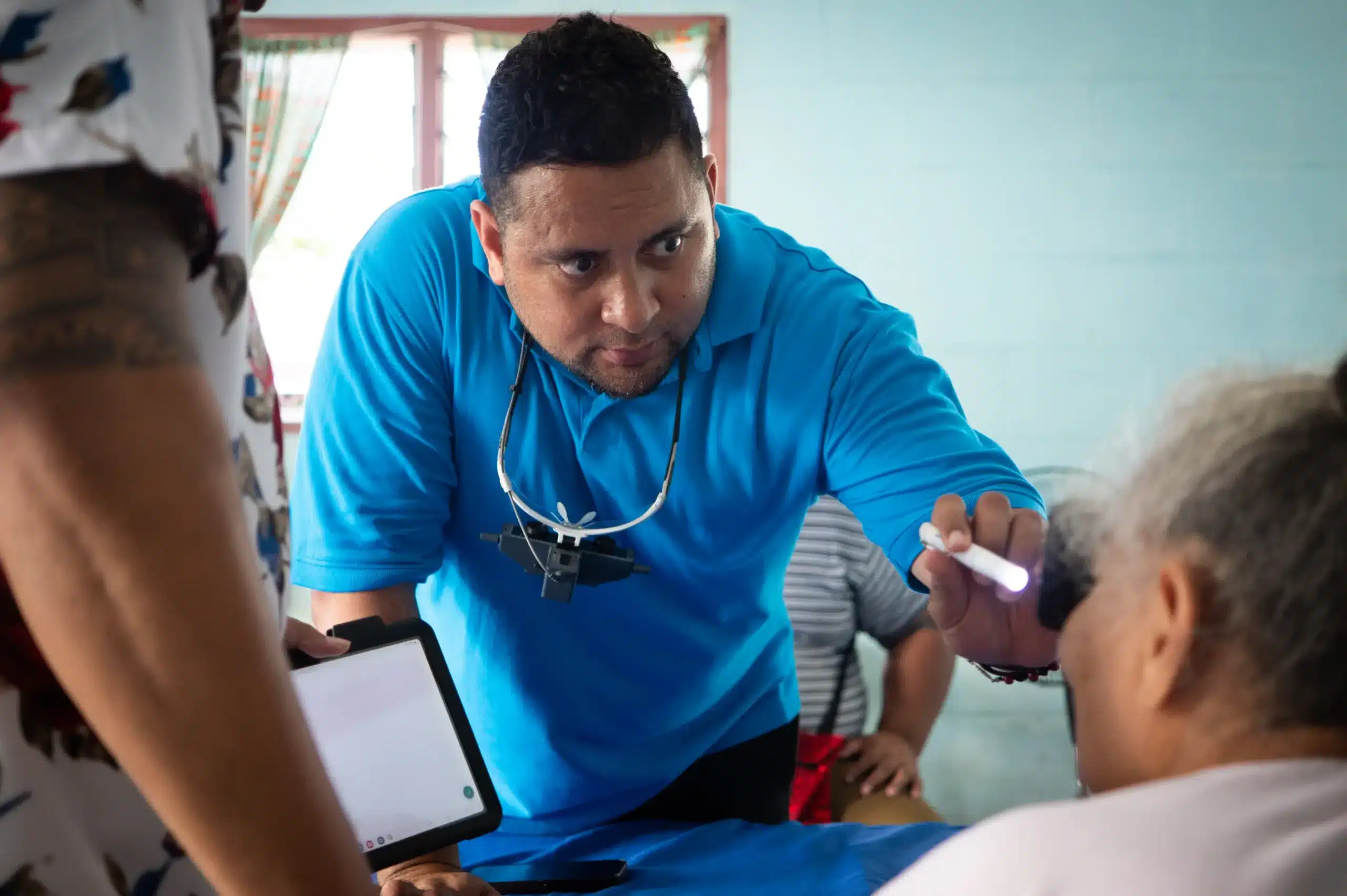 Dr Duke examining a patients eye