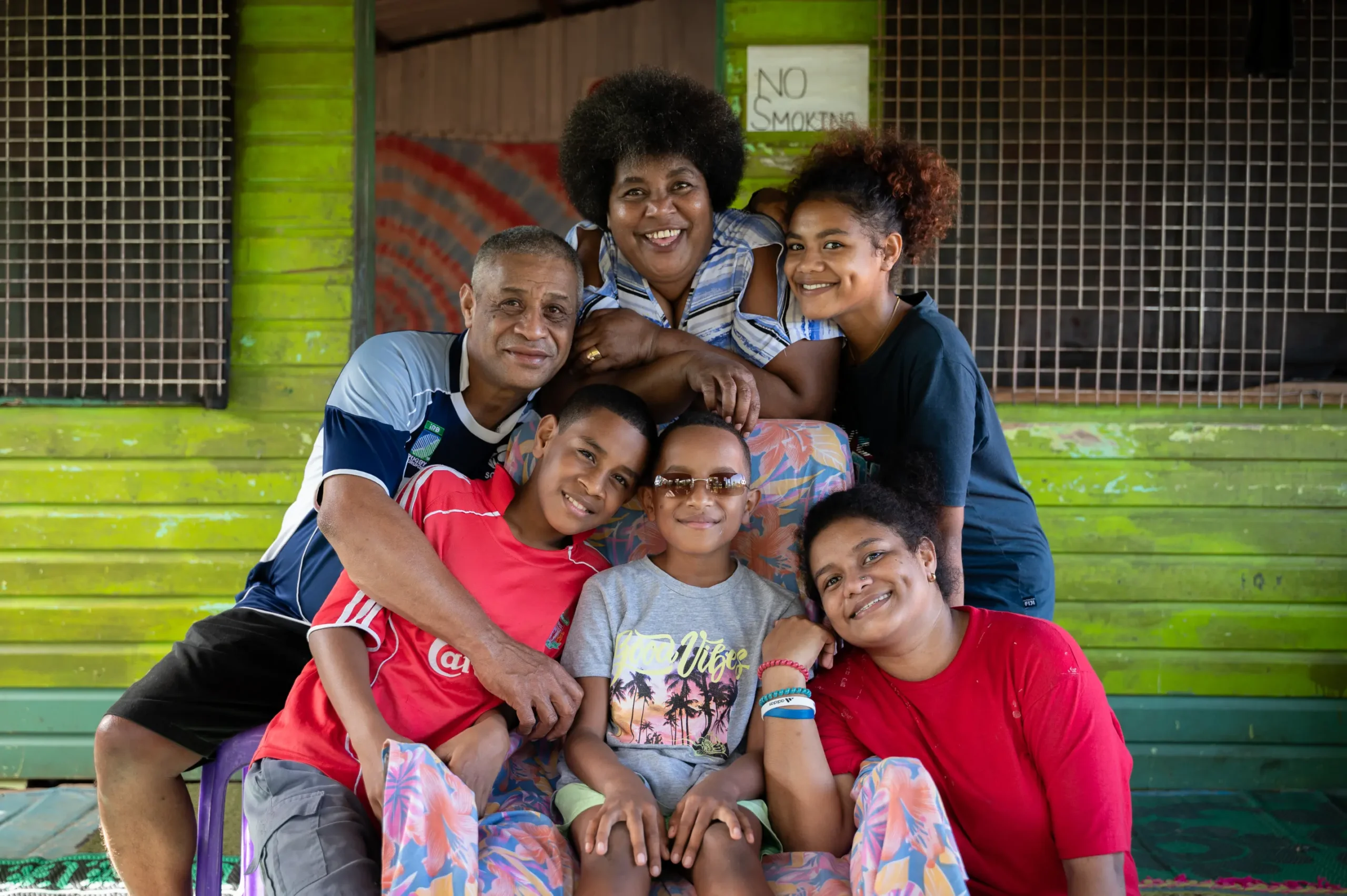Meli surrounded by his family after returning home from PEI