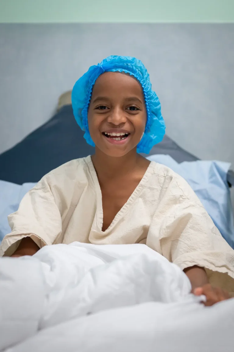 Meli in his hospital gown ready for surgery