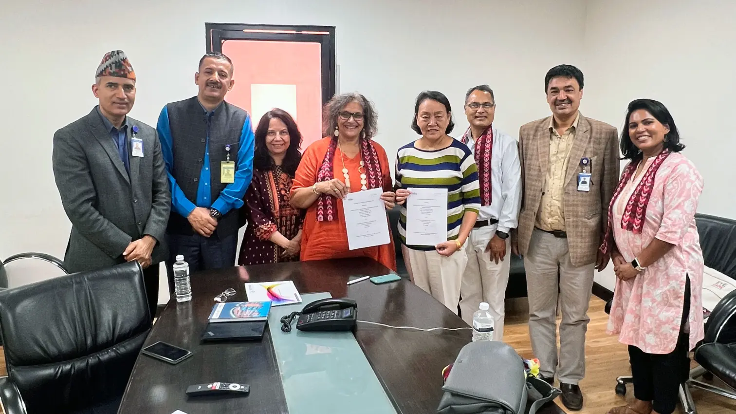 Fred Hollows and Tilganga Hospital representatives gathered to sign an MOU