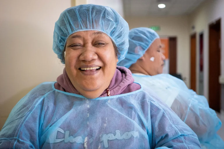 Sau smiling while waiting for her cataract surgery