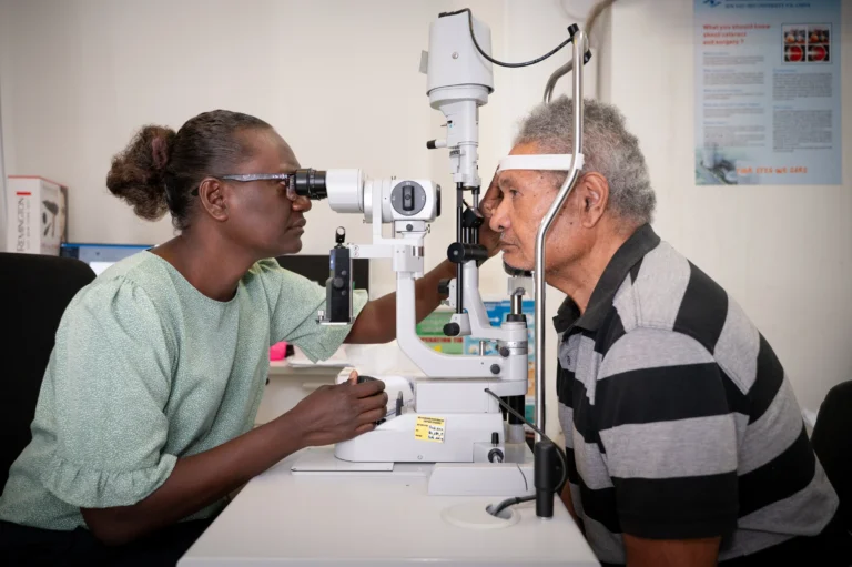 Dr Nola examining Penetito's eye