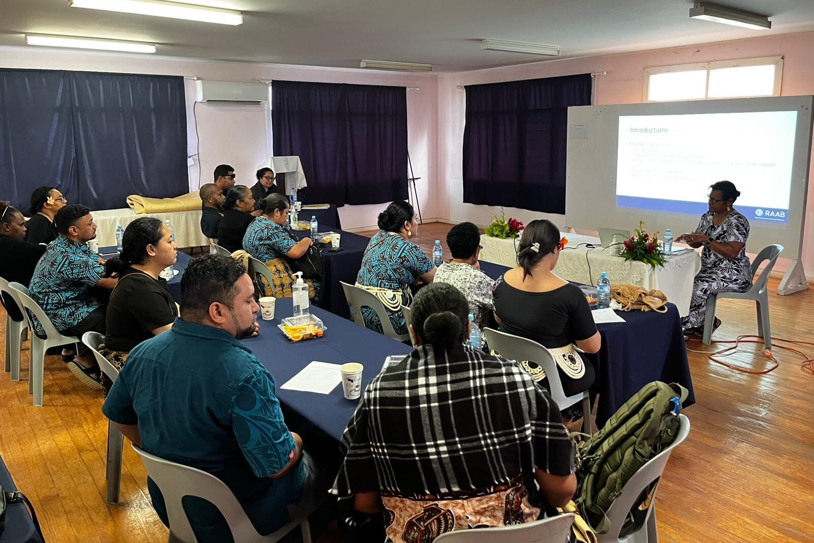 The RAAB team in a classroom for their training