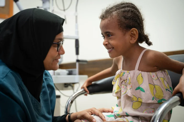 Philomena with an eye nurse
